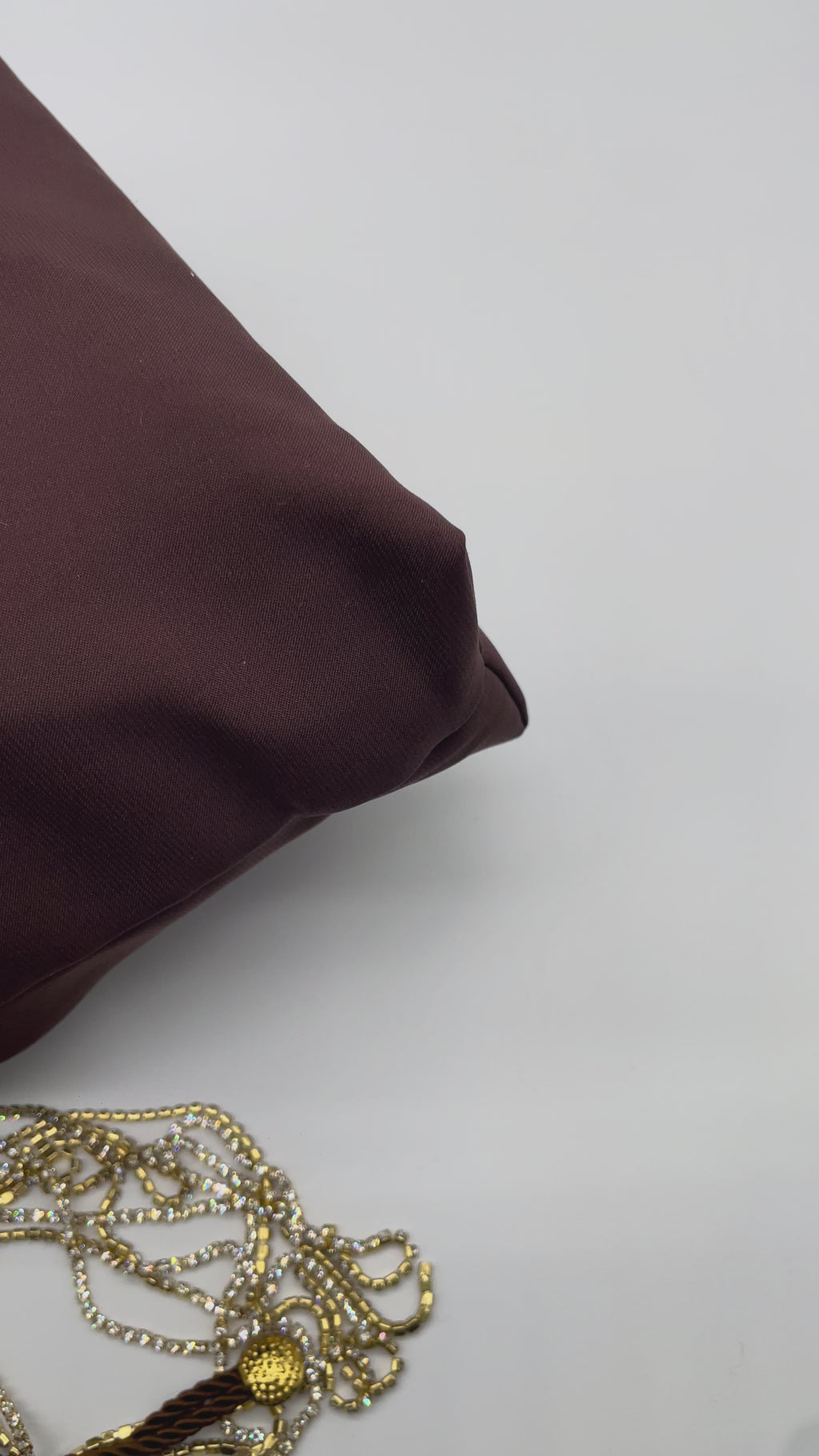 AURA | MARRONE